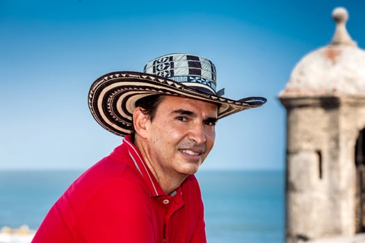 Travel concept. Male tourist wearing a sombrero vueltiao in Cartagena. Colombian people. photo