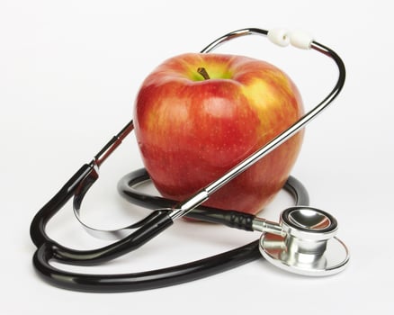 Apple and stethoscope photo