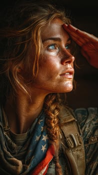 Woman soldier saluting with determination in a military setting during golden hour lighting photo