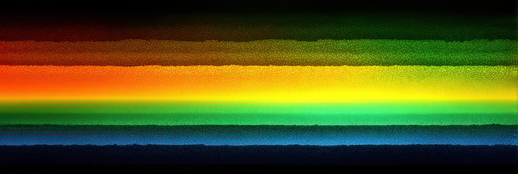 Vibrant spectrum of colors displayed in a horizontal gradient with smooth transitions from warm to cool tones photo
