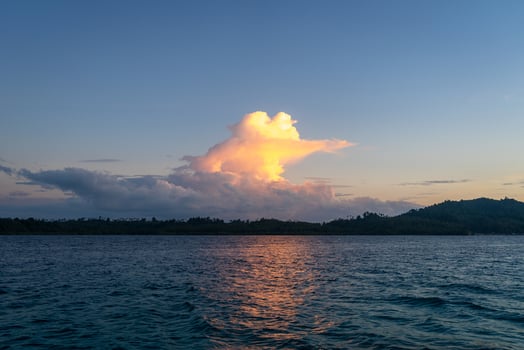 Sunset over Bolilanga Island, Togian archipelago, Sulawesi, Indonesia photo