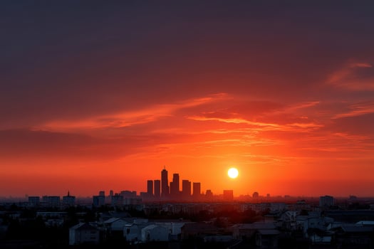 Sunset casts an orange glow over a skyline resembling cherished memories photo