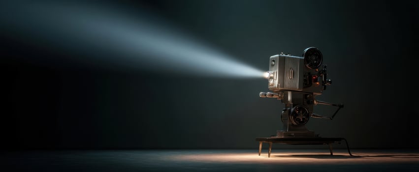 The vintage film projector illuminating a dark, artistic space for cinematic moments. photo
