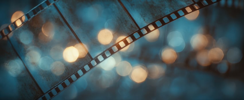 The film reel beautifully illuminated by glowing bokeh lights in a dreamy background photo