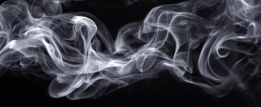The elegant dance of smoke against a dark background in abstract form. photo