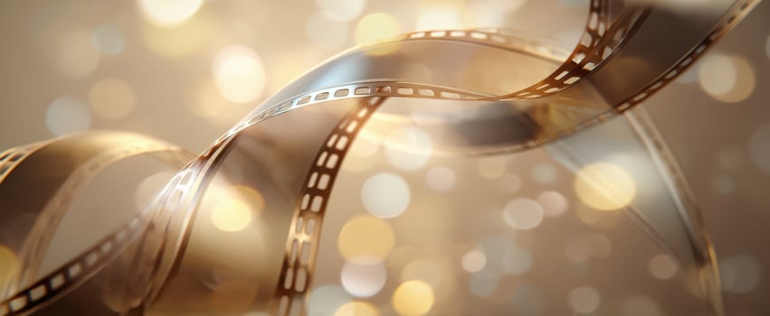 The Captivating Dance of Film Reel with Enchanting Bokeh Lights photo