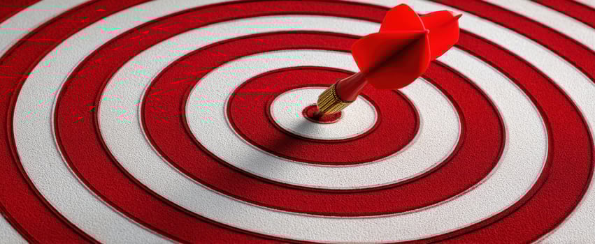 The dart hitting the bullseye in a vibrant target design photo