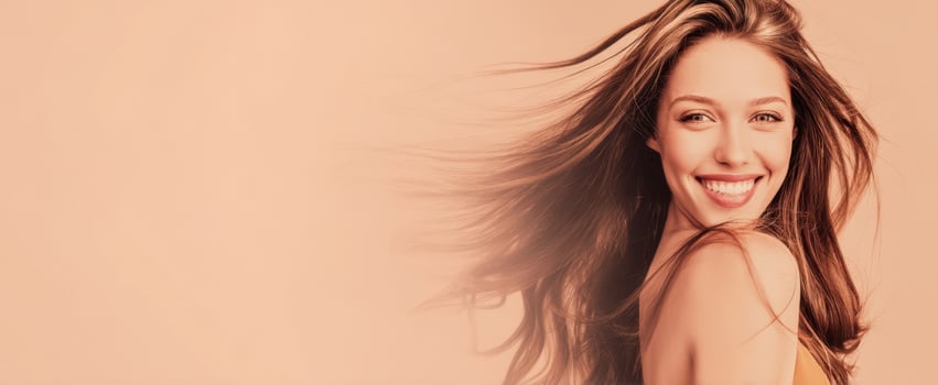 The joyful woman with flowing hair exuding confidence and beauty. photo