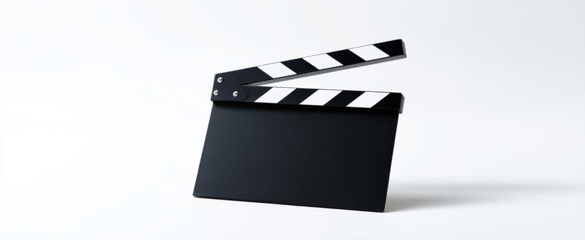 The clapperboard symbolizes creativity and storytelling in film production. photo