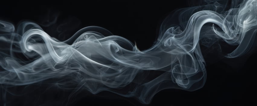 The ethereal beauty of swirling smoke against a dark background photo