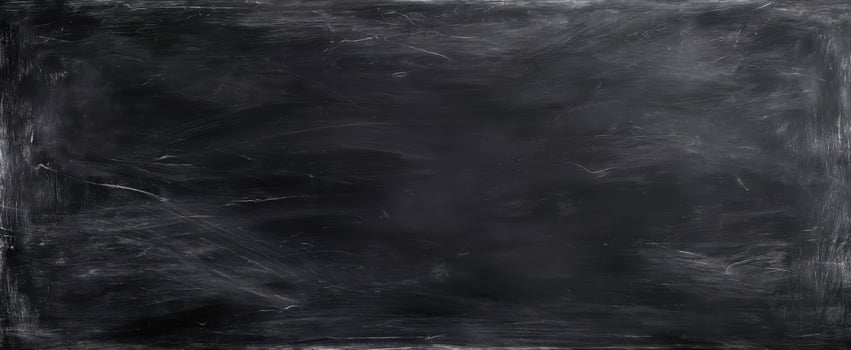 The black chalkboard surface ready for creative messages and ideas. photo