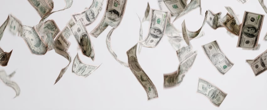 The flying dollar bills creating a sense of wealth and prosperity in the air. photo