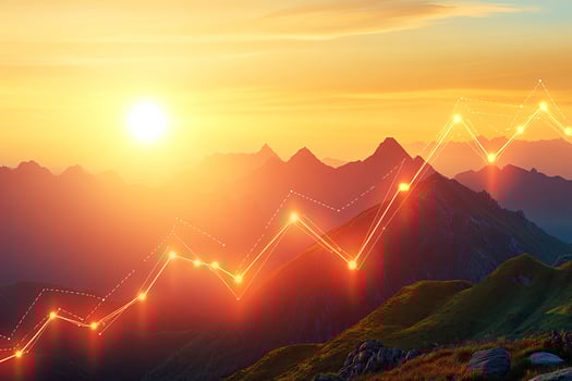 Sunrise over mountain peaks, upward trending growth chart photo