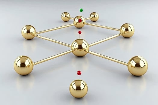 Gold spheres connected by rods, forming a network photo