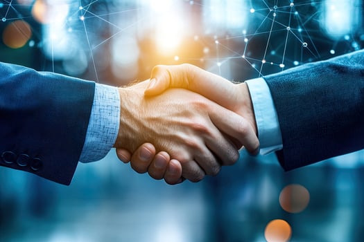 Business partnership handshake in modern digital environment photo