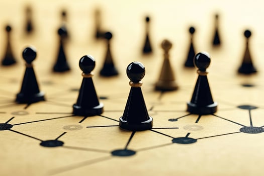 Strategic positioning of dark pieces on a light board photo