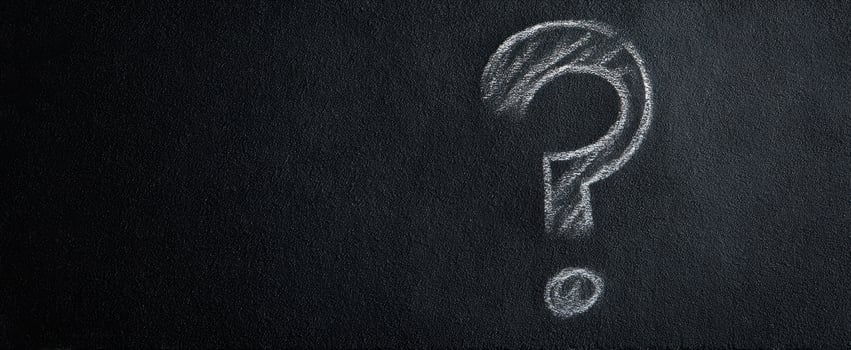 The question mark symbolizing curiosity and the quest for knowledge on a chalkboard. photo