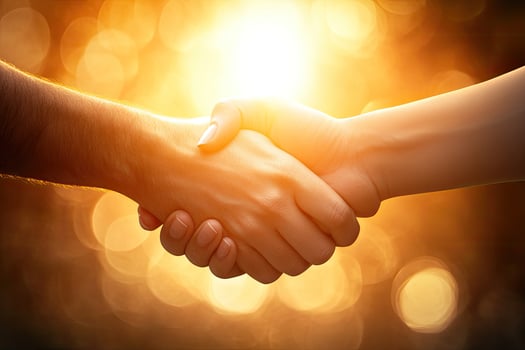 A handshake in golden light photo