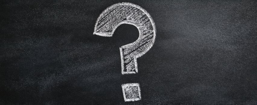 The Question Mark on a Chalkboard Symbolizing Inquiry and Curiosity photo