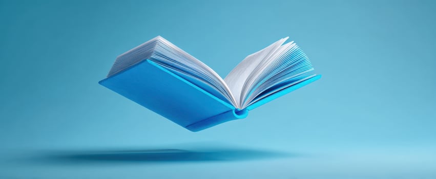 The enchanting floating blue book amidst a minimalist background for creative inspiration. photo
