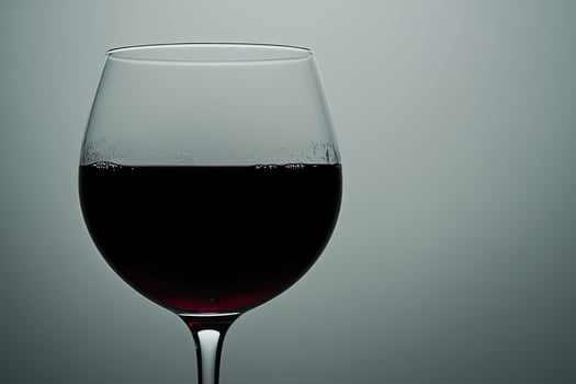 Close-up of a glass of red wine photo