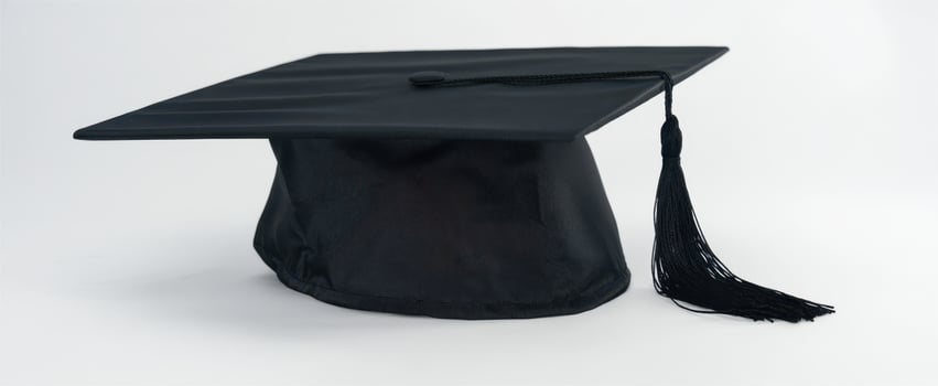 The black graduation cap symbolizing academic achievement and celebration. photo