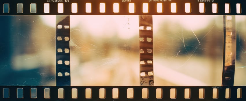 The vintage filmstrip showcasing blurred nostalgic moments in captivating light. photo