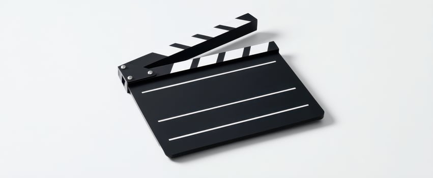 The black clapperboard ready for filming in a professional cinema environment. photo