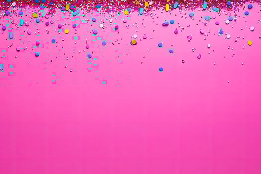 Vibrant sprinkles border on pink backdrop photo
