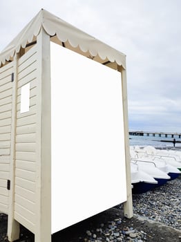 Billboard sign mockup in the beach environment, blank space to display your advertising or branding campaign. photo