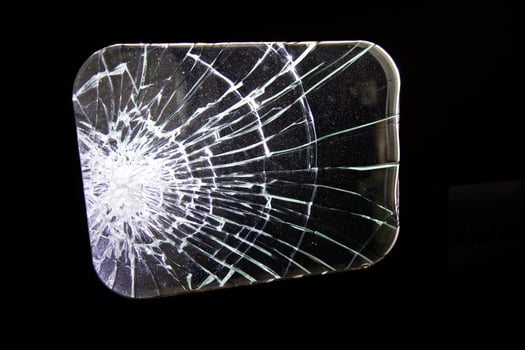 Close-Up of Shattered Glass Pane photo
