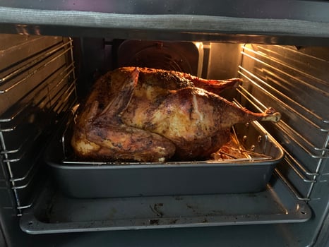 Roasted Turkey in Oven Ready for Dinner photo