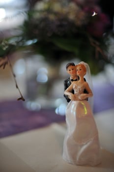 Wedding Cake Topper Figurine of Bride and Groom photo