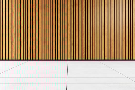 Modern wooden wall paneling on tiled floor photo