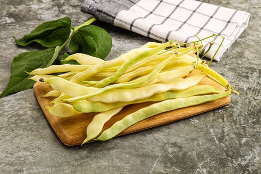 Fresh green beans on a cutting board photo