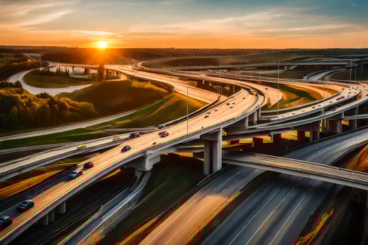 Highway traffic at sunset in the city photo