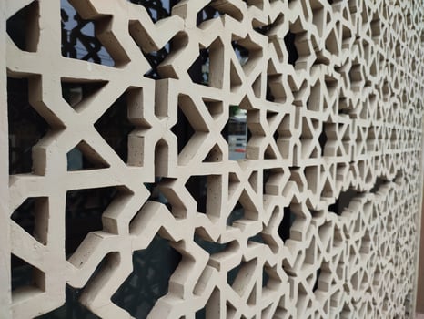 a decorative wall with geometric patterns on it photo