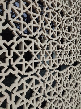 islamic lattice wall in islamic architecture photo