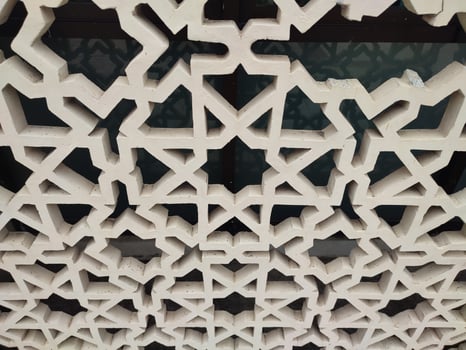 islamic pattern on the ceiling of a building photo