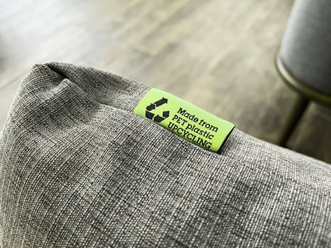 Eco-friendly textile product with a clear upcycling label, promoting sustainable practices and circular economy in modern consumer goods photo