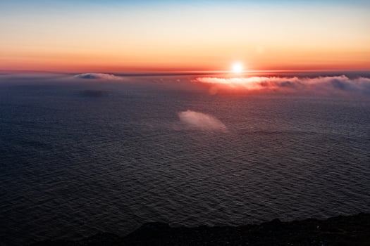 Midnight sun sunset at northenmost point of continental Europe North cape photo