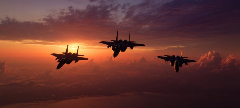 The majestic flight of military jets at sunset against a dramatic sky photo