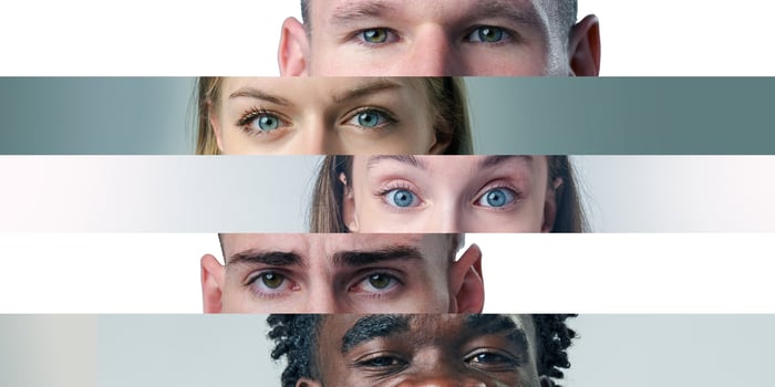 Diverse group of individuals with striking blue eyes showcasing unity and connection photo