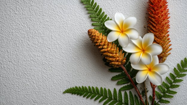 White and Orange Flowers with Fern on Textured Background photo