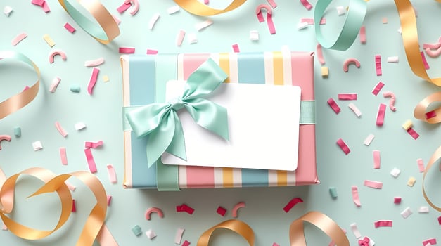 Charming Flatlay of Pastel Striped Gift with Mint Bow, Surrounded by Ribbons and Confetti photo