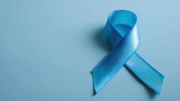 The blue ribbon representing awareness and support for various health initiatives. photo