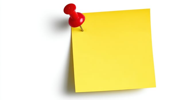 The yellow sticky note with a red pin for reminders and messages photo