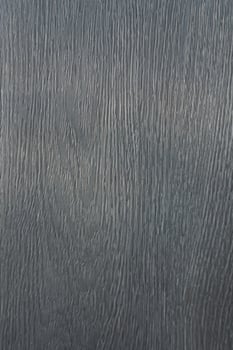 Close-up of textured gray wood grain with subtle horizontal lines and muted tones photo