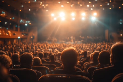 A Grand Evening An Audience Enjoys the Lively Performance at Theater Hall photo