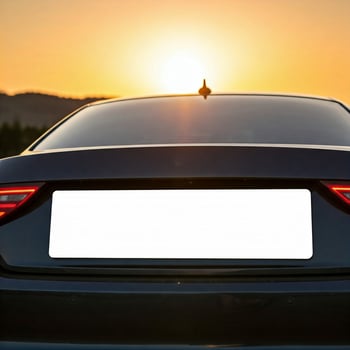 A mock white car license plate isolated on white photo